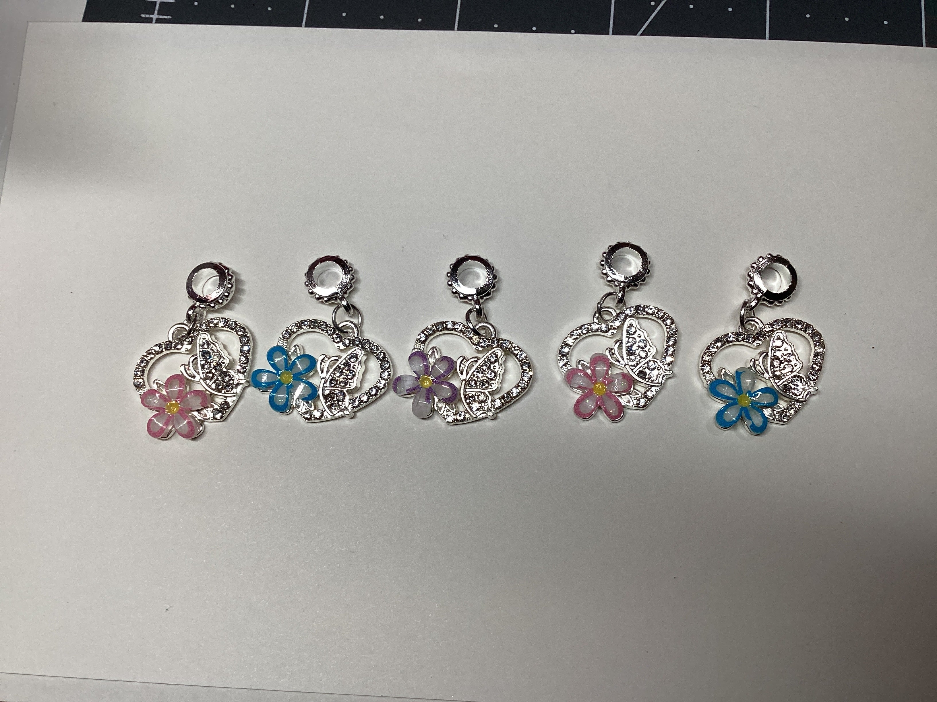 Silver heart and flower dangle pendant